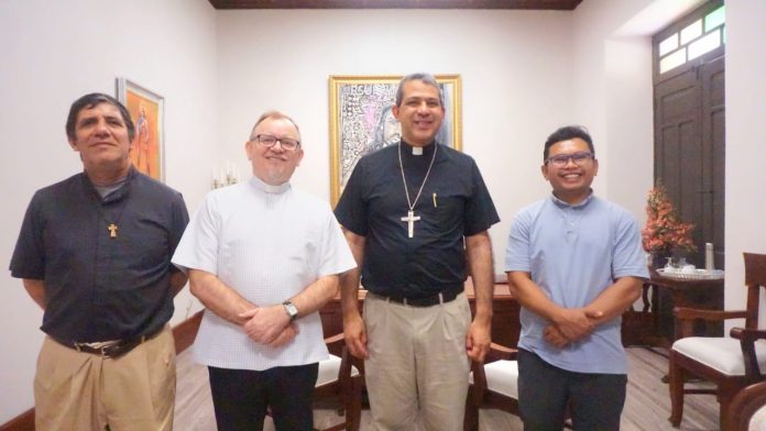 Reunión Mons. Carlos