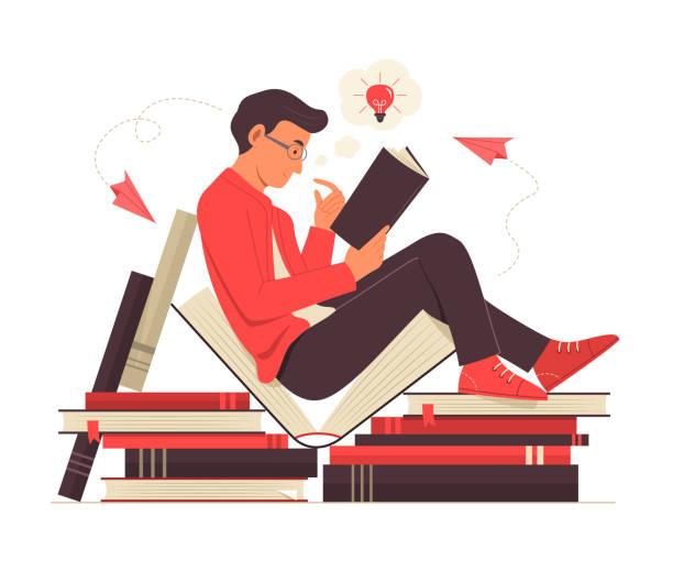 Man reading a book and thinking good idea.